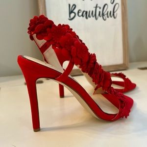 Beautiful red holiday heels by Jessica Simpson, almost perfect condition.